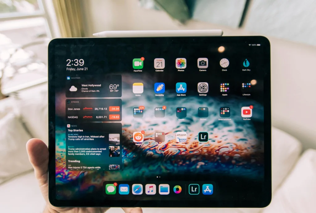 Apple device with home screen view.