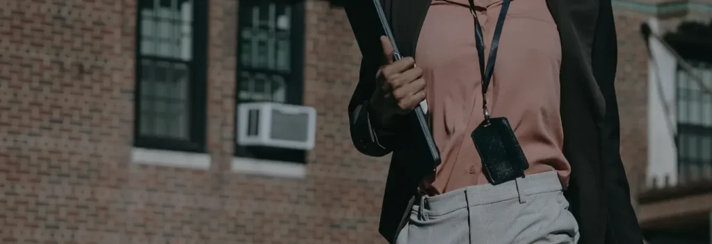 a girl holding laptop.